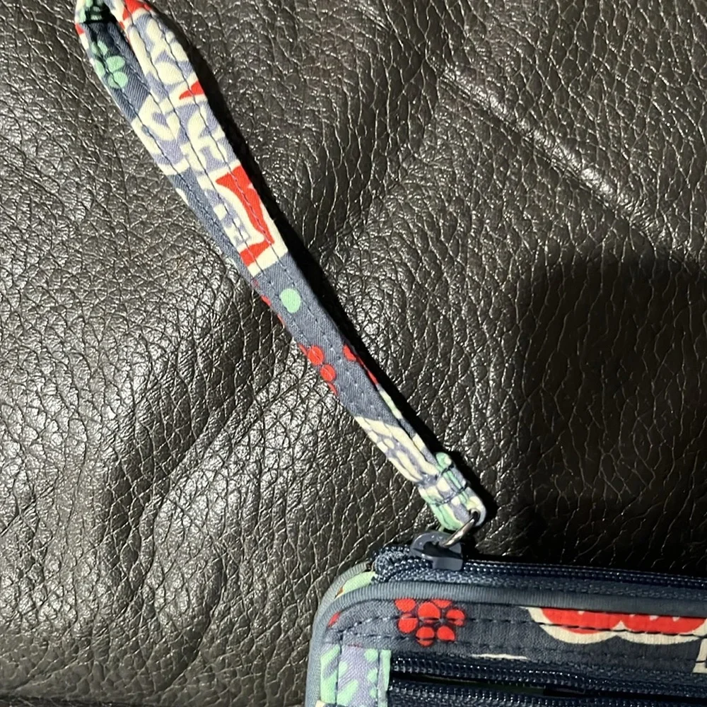 Vera Bradley front zip wallet in nomadic floral